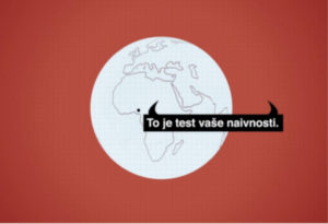 Grafika, na kateri je bel svet na rdečem ozadju ter napis "to je test vaše naivnosti"